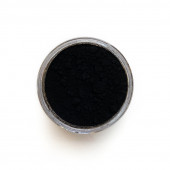 Spinel Black pigment in a 15 ml jar.